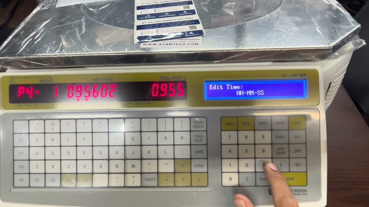 Program time and date on Easy Weigh LS-100 label printing scales. #business #tutorial #scale