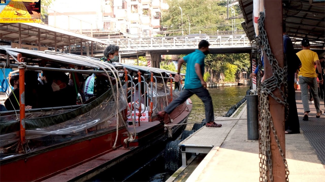 Khlong Saen Saeb Canal Boat Passengers disembarking at Pratunam Pier Bangkok Thailand