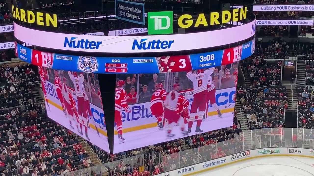 Boston College Student Section Celebrates a goal at the Beanpot.