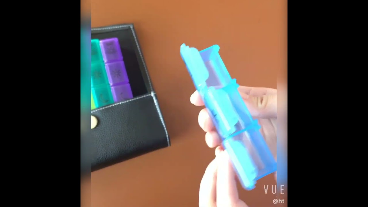 Look this black wallet 7 day pill box! How about this color? Do you like it?