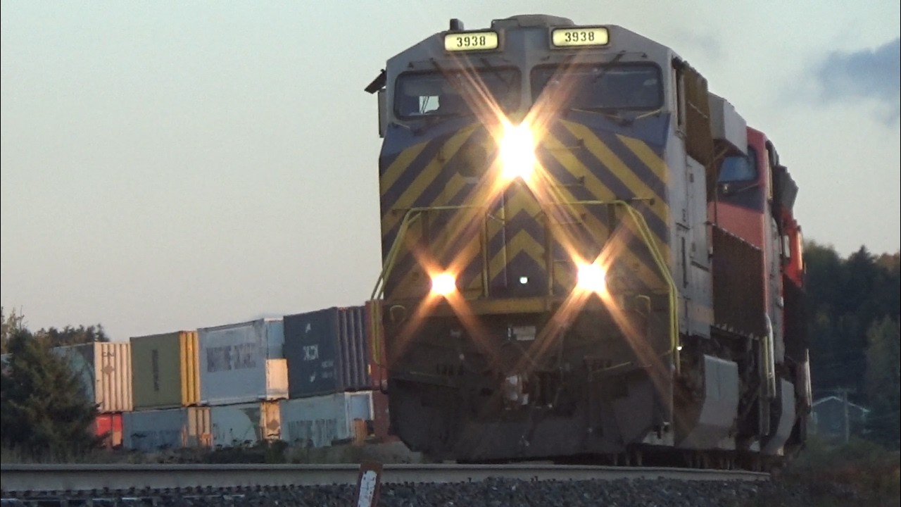 Long Double Stack Train CN 120 w/DPU approaching Upper Dorchester, NB at Track Speed