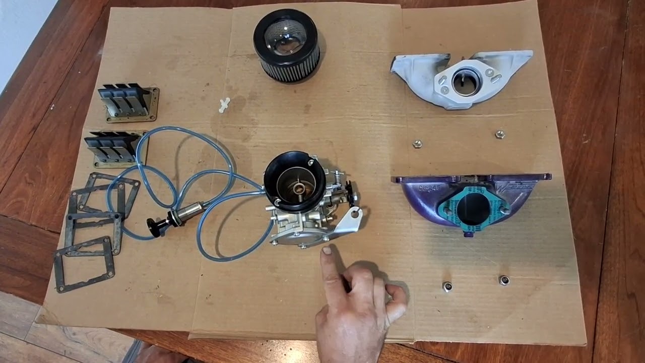 Parts needed to put a Mikuni SBN44 on a Kawasaki 650 Jet Ski.