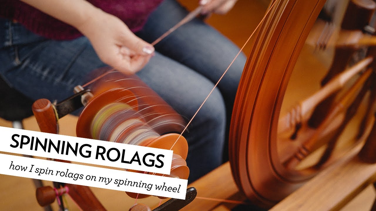 Spinning out of my comfort zone... woolen long draw on my spinning wheel
