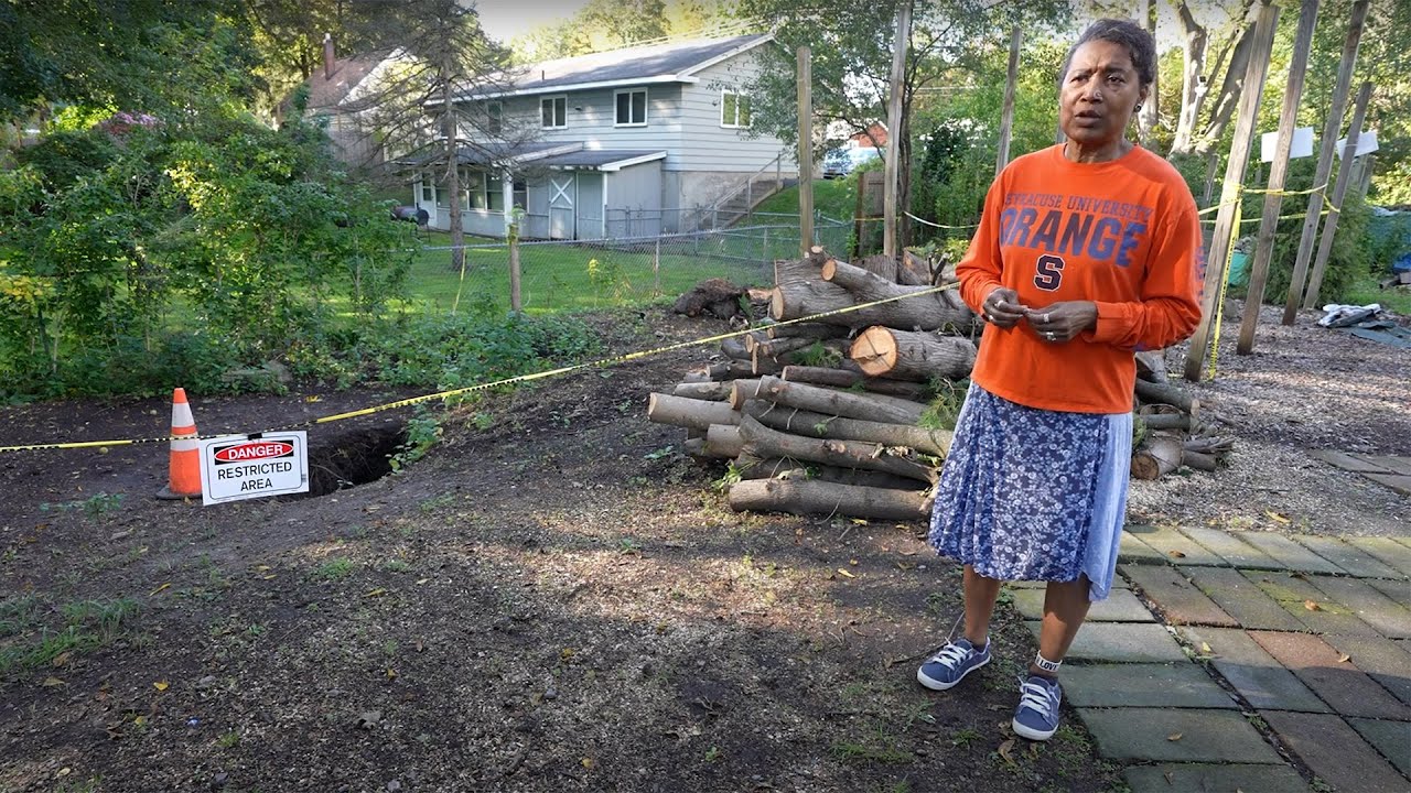 Syracuse residents confront a mystery: What’s behind the sinkholes and falling trees?