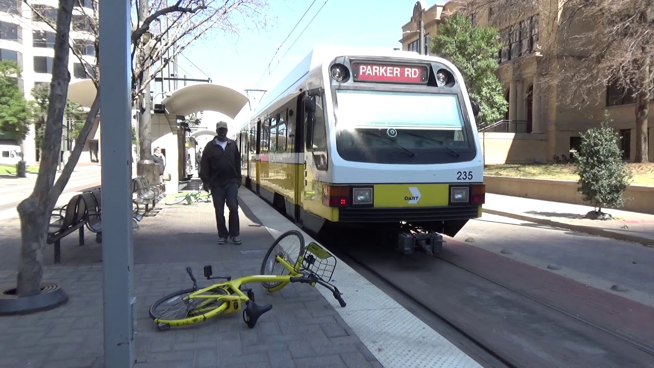 DART Announcement Sign and Train Action at Pearl Arts District Station, with Crazy Bike Guy!