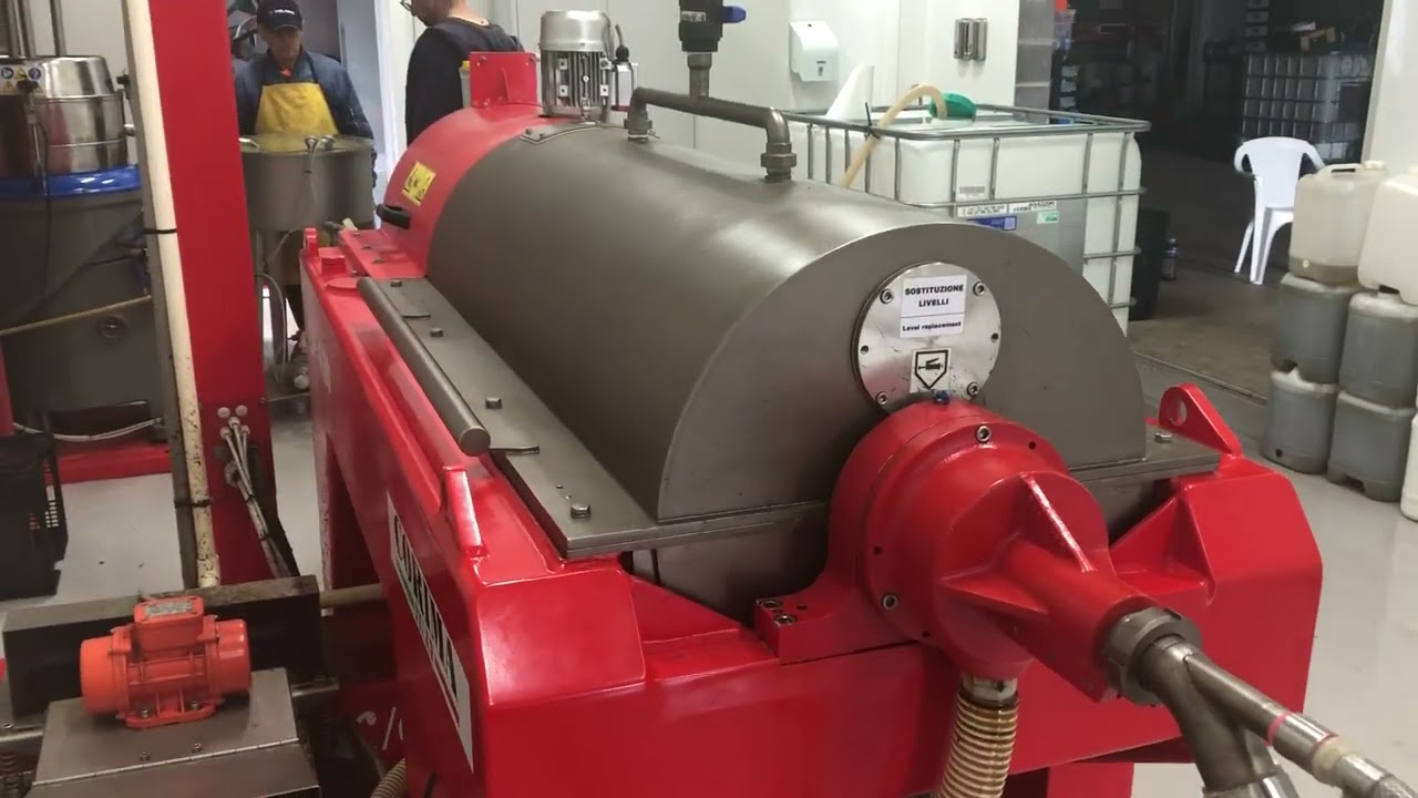 Aril Estate olive oil decanter and malaxer in action