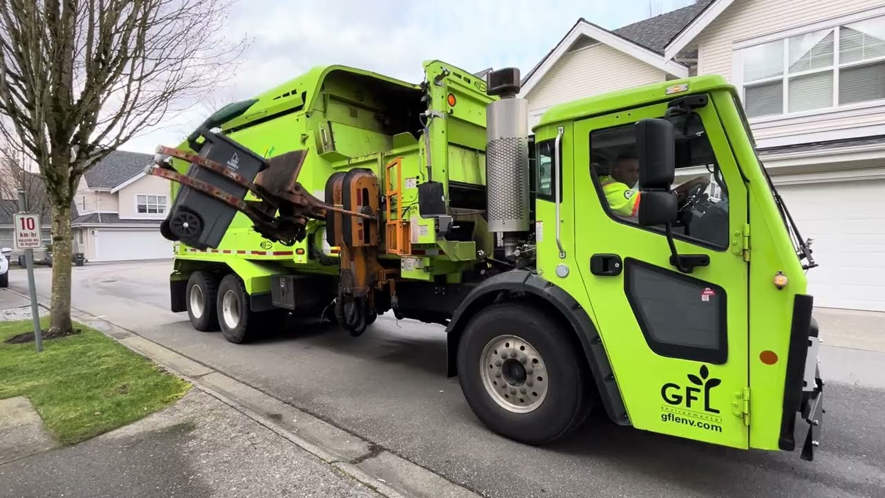 GFL Mack LR Labrie automizer on townhome 32 gallons.