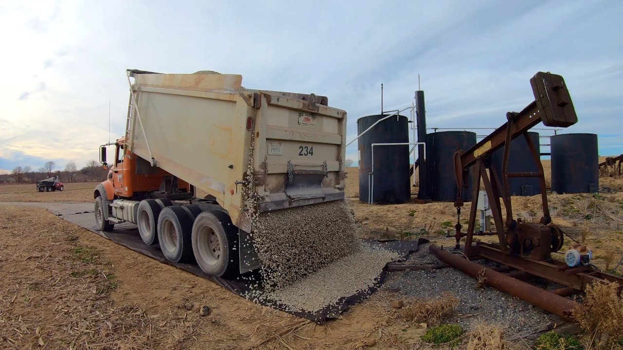 Building Gravel Access Road to Oil Well Tank Battery