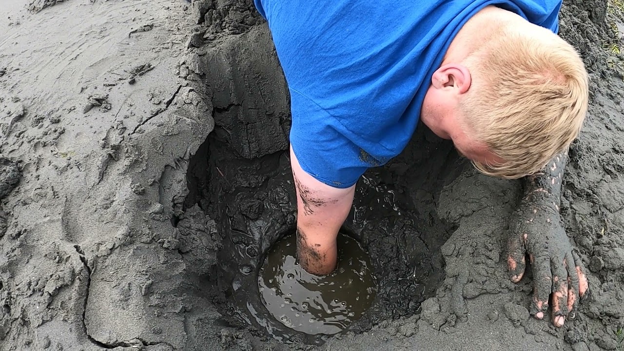 Digging Geoduck in the Puget Sound.