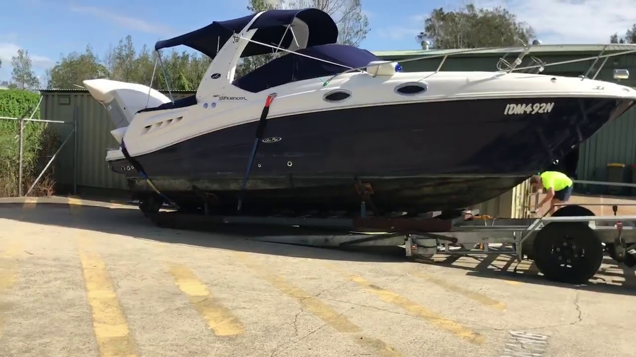 Slip Away Boat Transport dropping off a Sea Ray Sundance 260 to a marina in Sydney