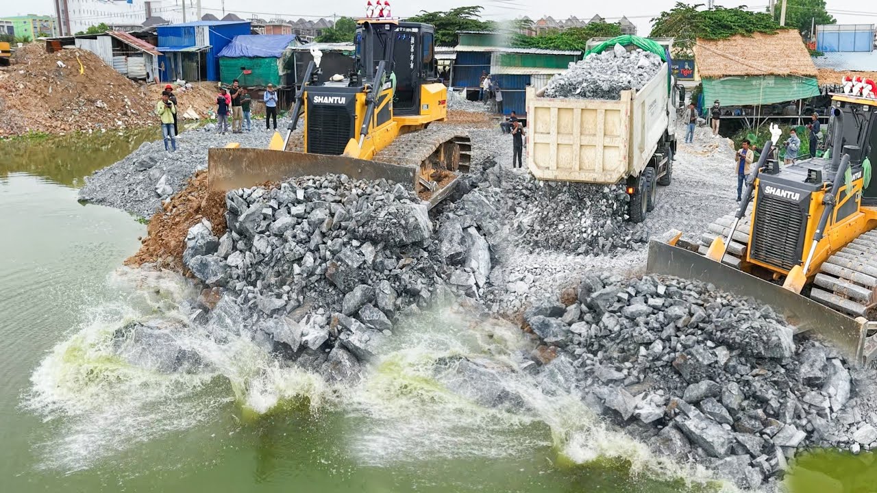 Today !!Continue build new road cross the water use Stone SHANTUI C3 DOZER with 25T DONGFENG TRUCKS