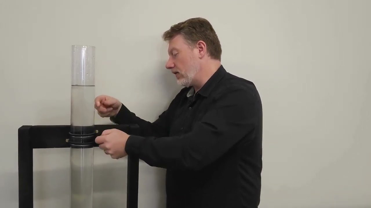 Performing an IPX7 water resistance test for consumer products.