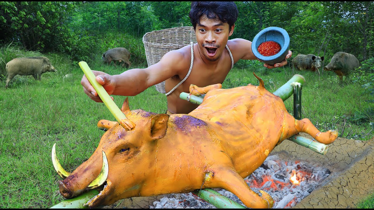 survival in the rainfores - cooking This meat is very delicious - cook pig