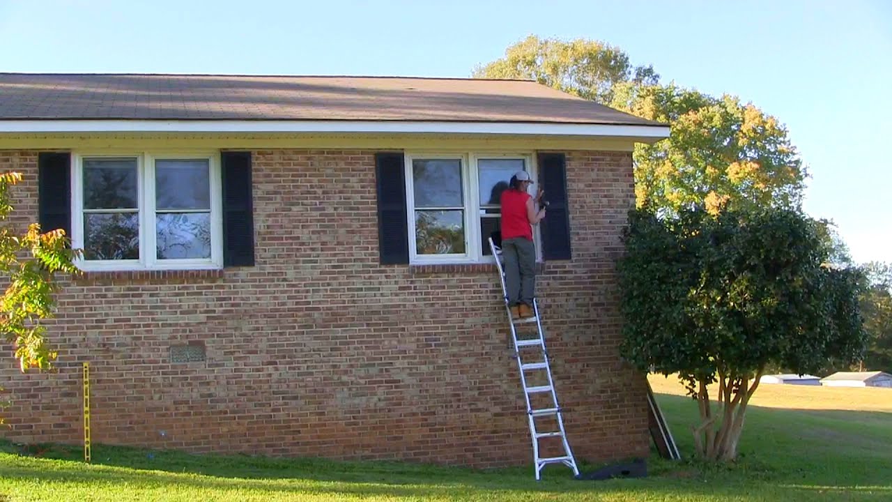 Installing Shutters To Brick House