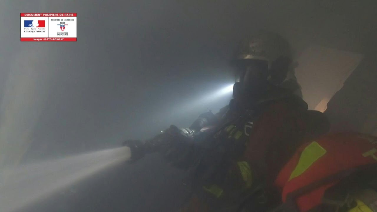 Firefighters' images from apartment building blaze in Paris | AFP