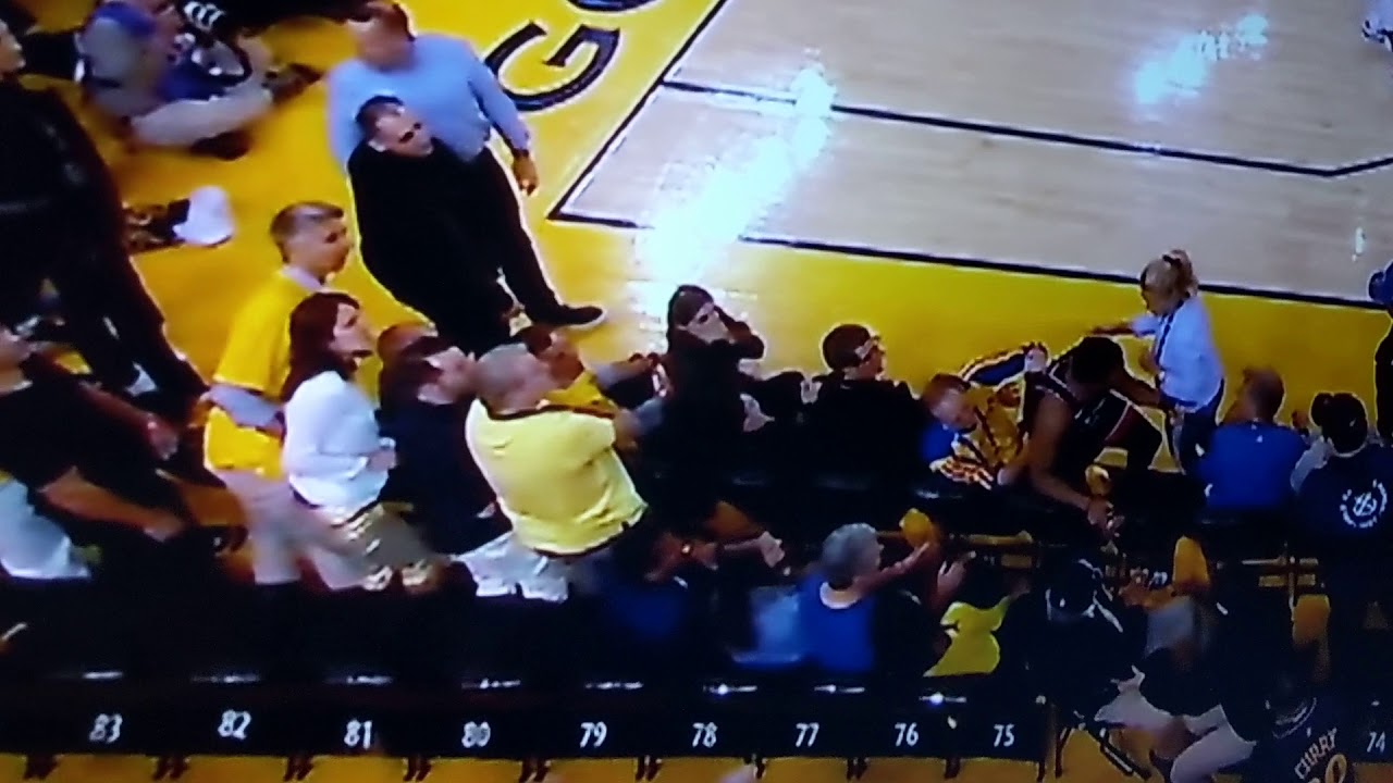 Kyle Lowry gets pushed by Golden State fan in NBA Finals game 3.