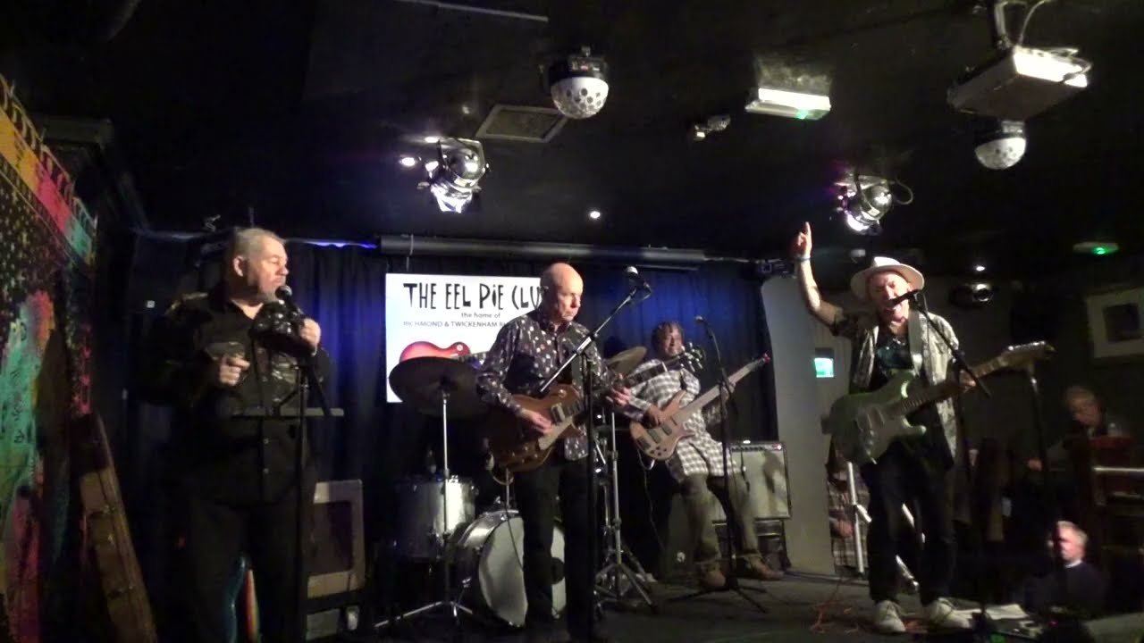 Fast paced opening riff by Robin Bibi heralds another superlative harmonica sol0 by Alan Glen.