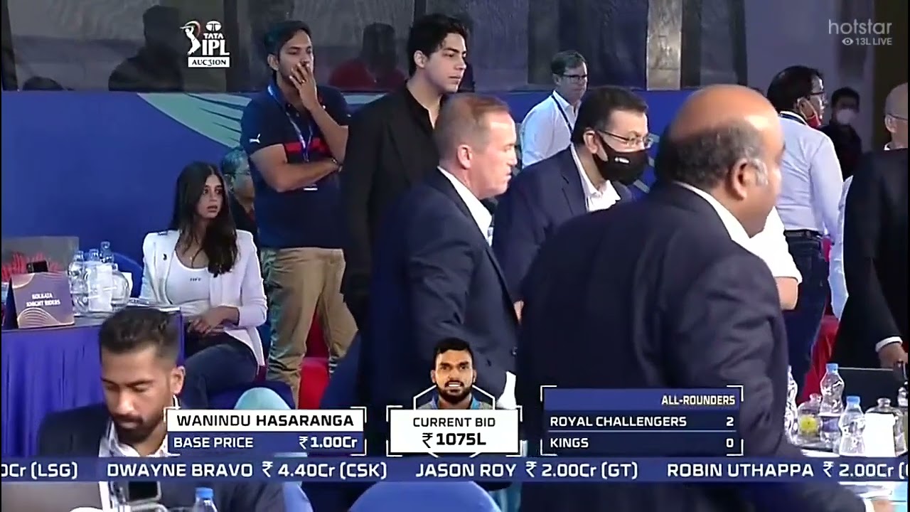 IPL Auctioneer Hugh Edmeades falls from the stage.