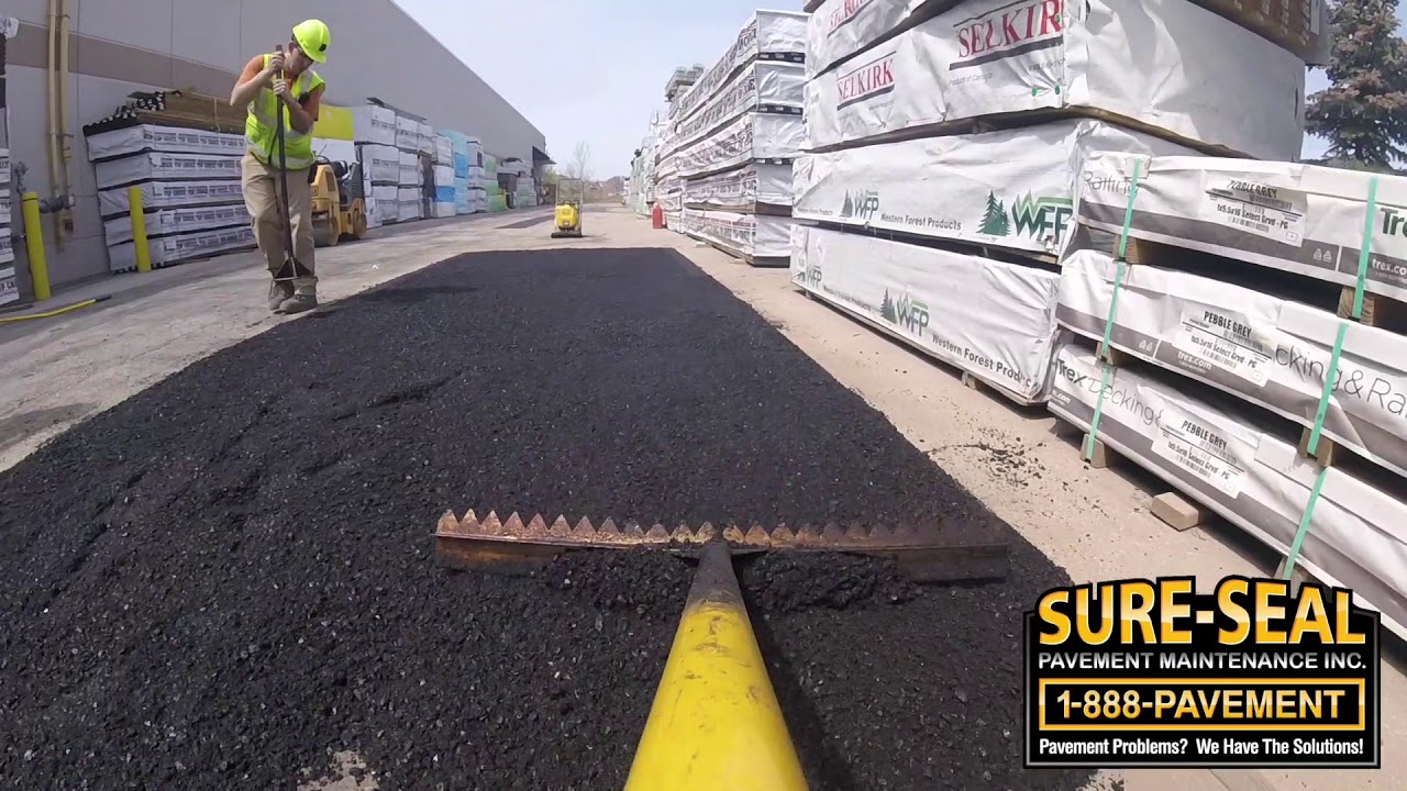 Asphalt Parking Lot Repair Process by Sure-Seal Pavement Maintenance Inc.
