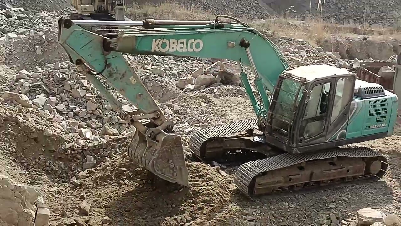 Stone mines work Tractor loading TATA truck moram loding stone work 