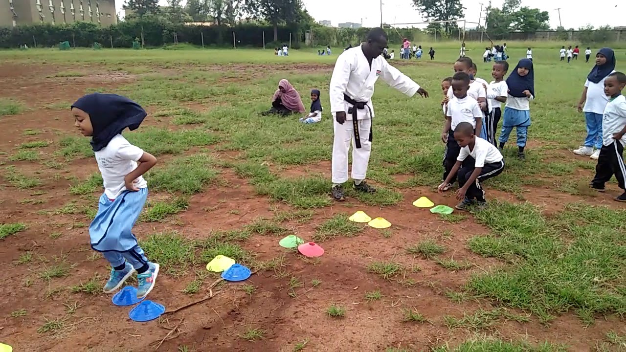 Tomylee - Kenya Karate Coach training kids at Nawiri Junior school