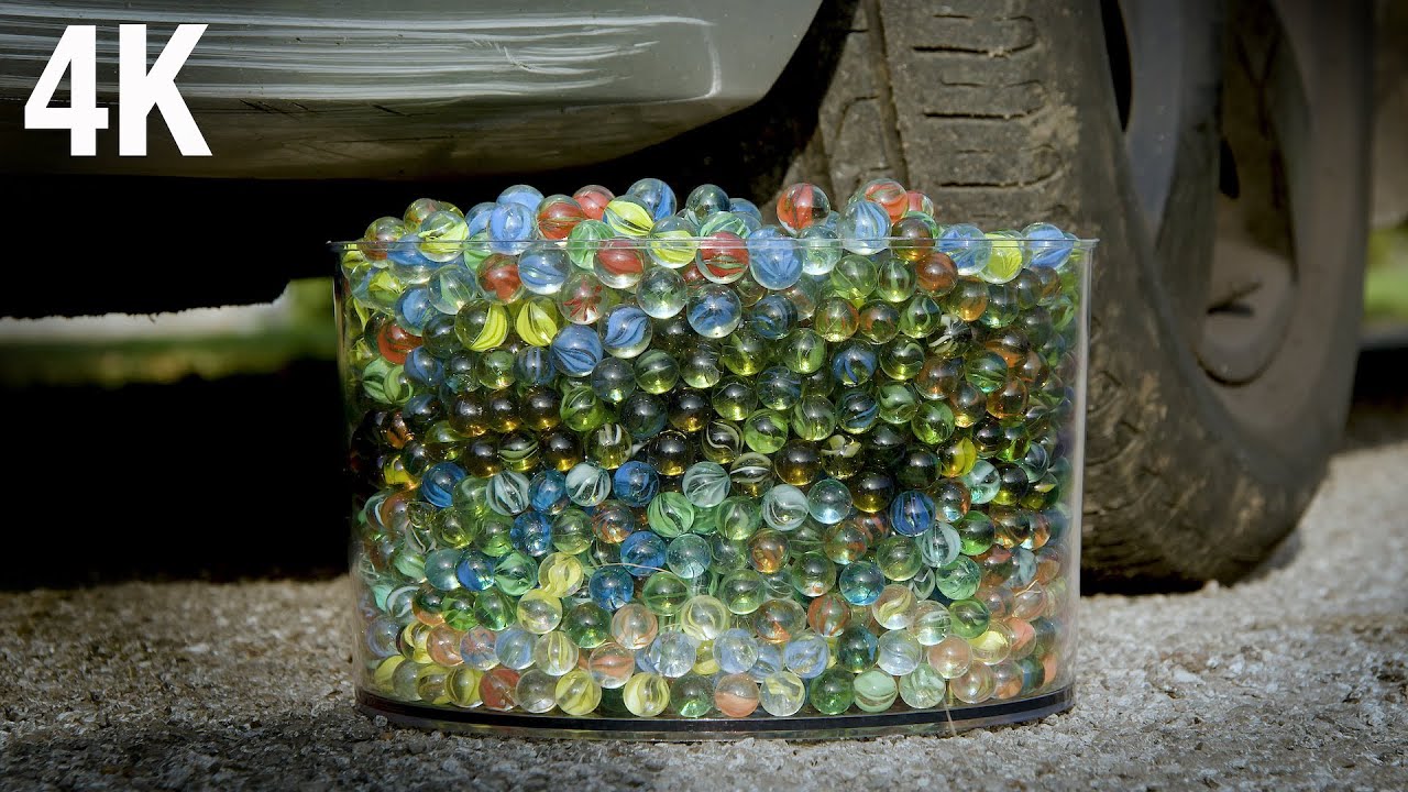 INSANE CAR vs 2500 MARBLES in 4K Slow Mo!