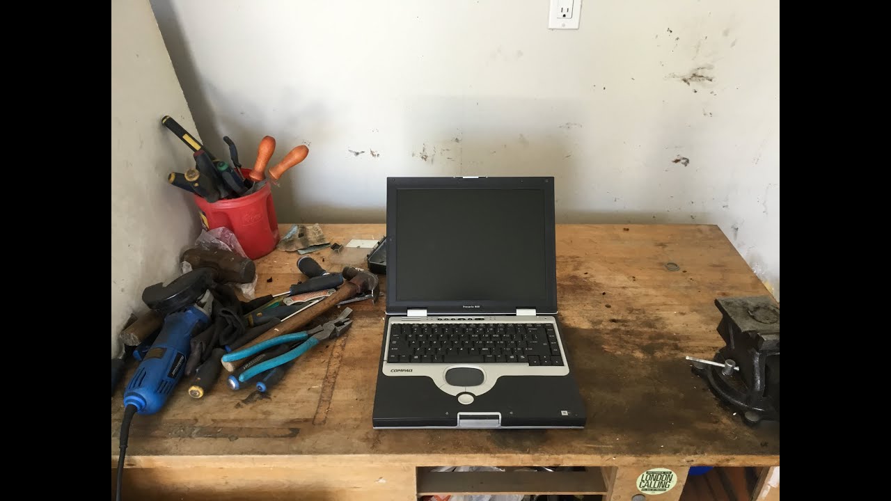 Scrapping a laptop for gold, silver, copper, and other metals.
