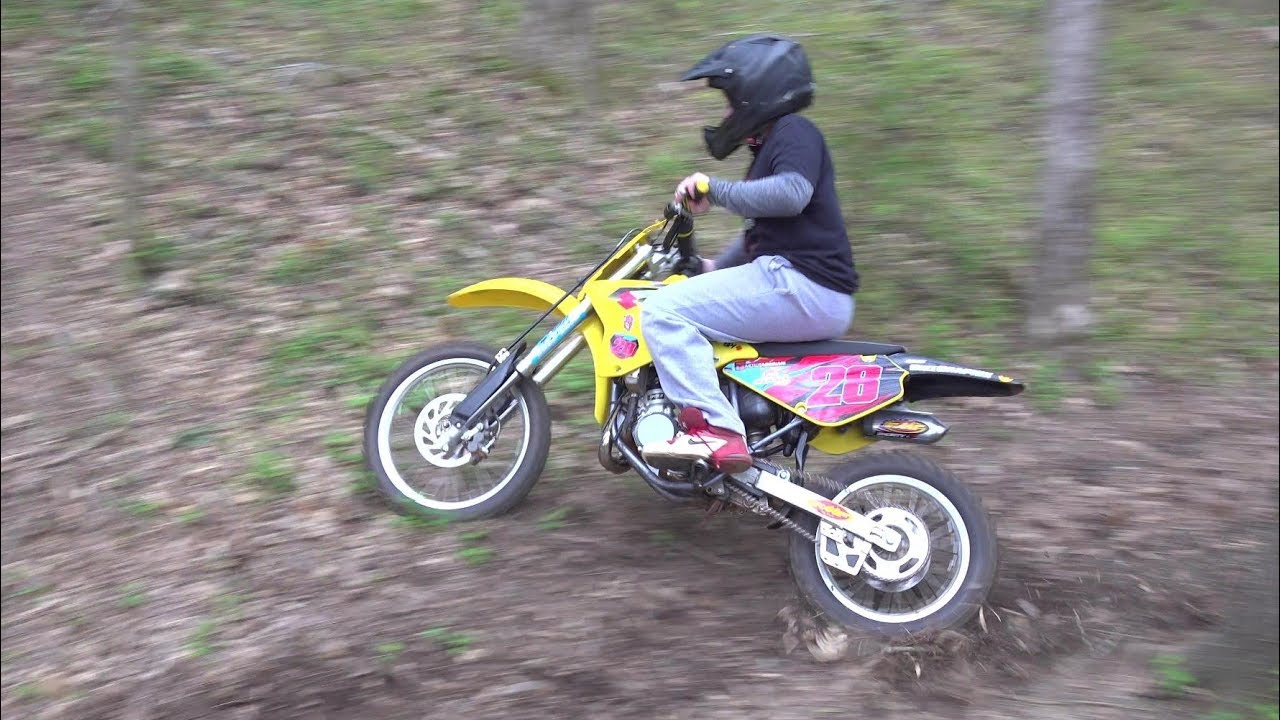 A kid and his dirt bike Dad can you build me a track??
