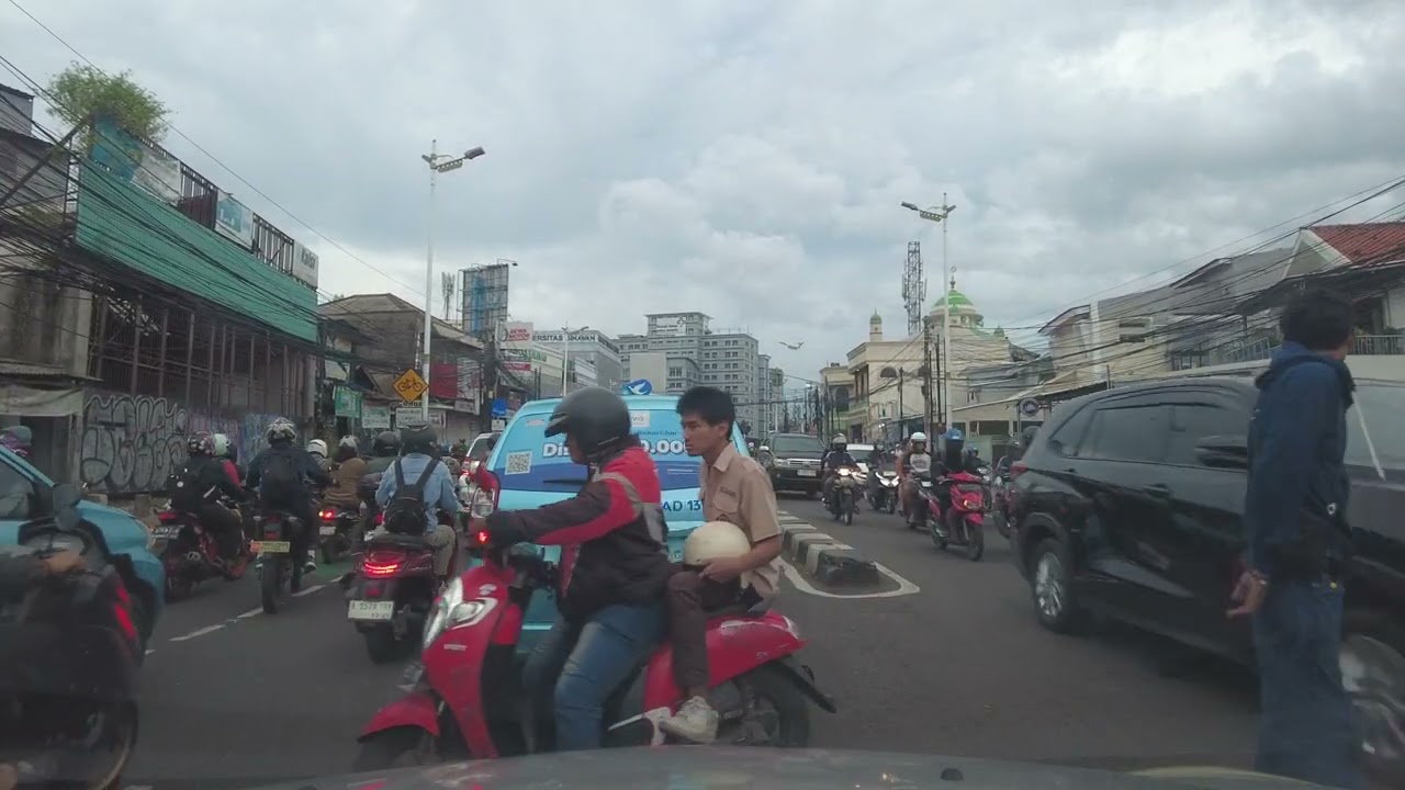 Drive in East Jakarta From Cililitan to Dewi Sartika Street - Real City Traffic