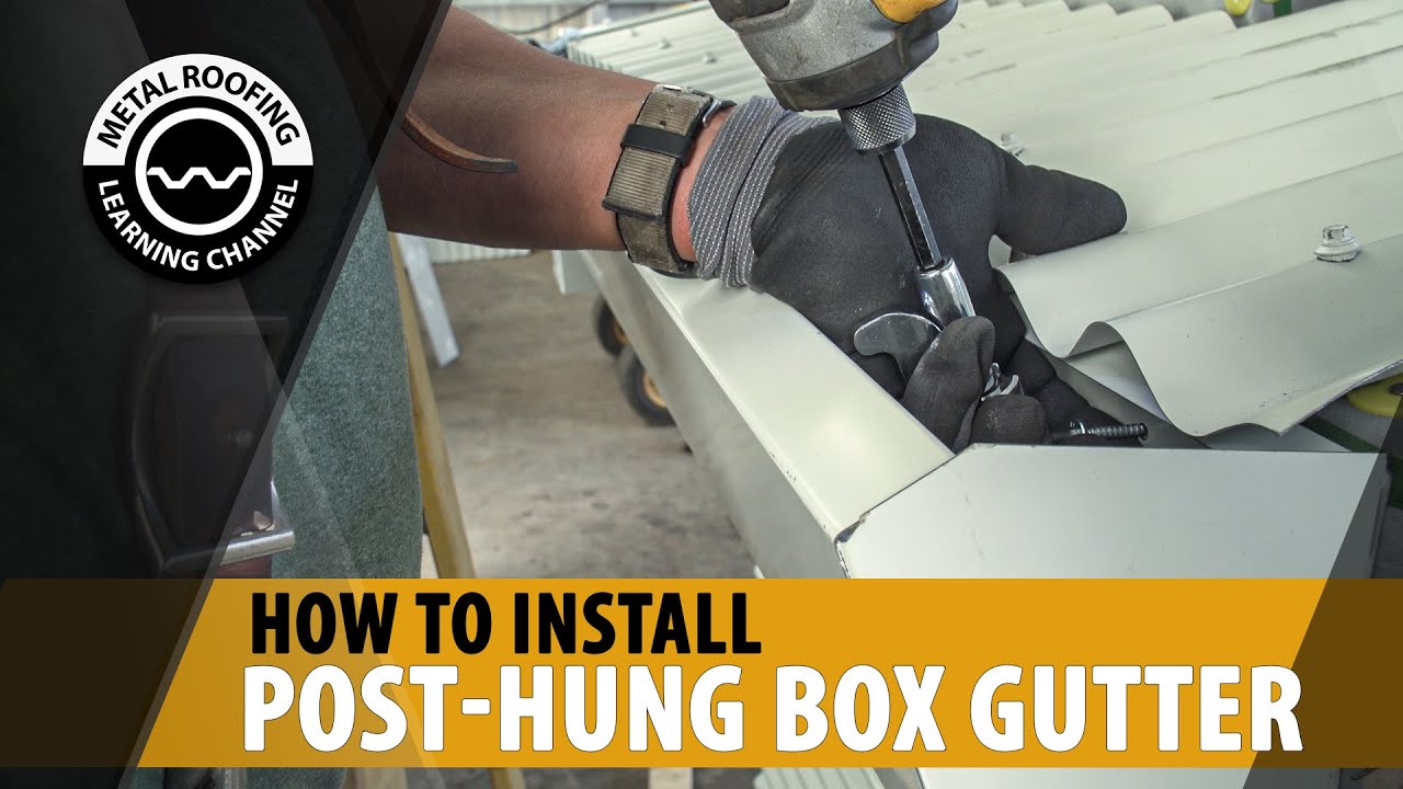 Hanging DIY Gutters For Metal Roof. Post-Hung Rain Gutter Installation With Metal Roof.