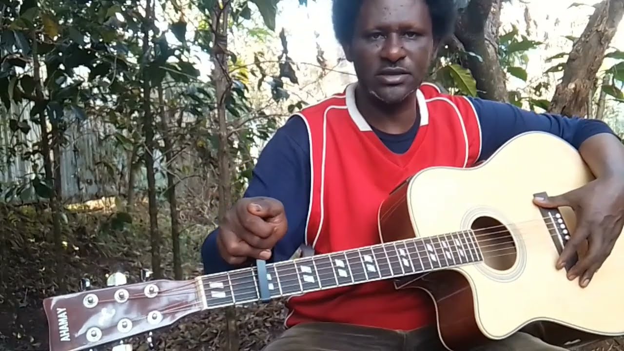 Barumsa Gitaaraa ji'a 1 kutaa 1ffaa @rutacoffea ruta-waliin_Guitar lesson part 1