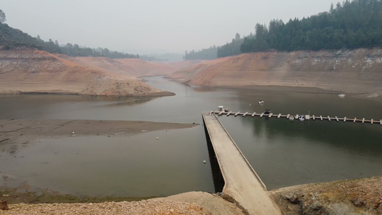 Lake Shasta drought low water reveals old Hwy 99 Pollock Bridge, CA 08-2021 - HD 4k drone video
