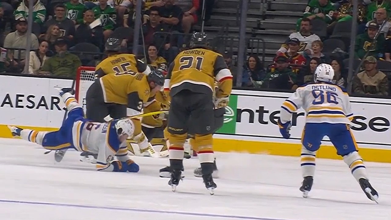 Brayden McNabb Lays a Big Hit on Zach Benson