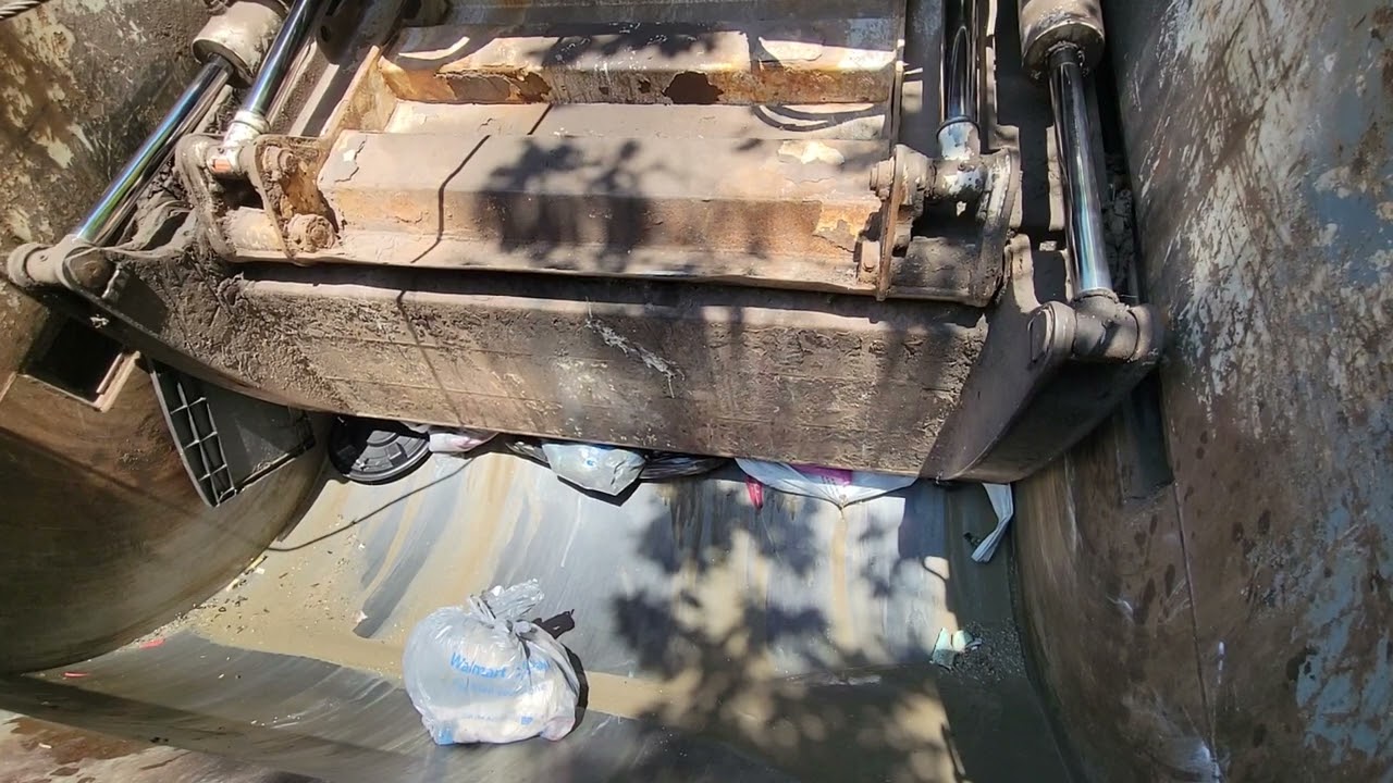 Garbage Truck Packer Compactor Smashing Trash 1
