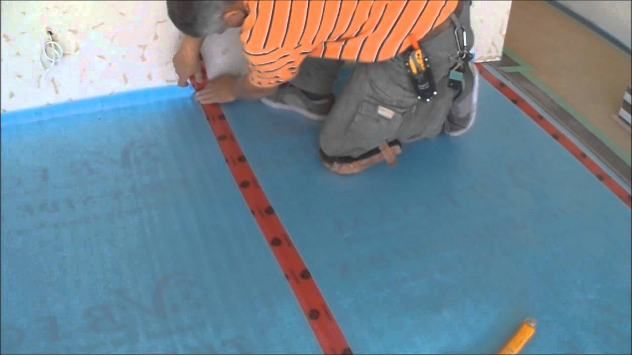 Installing the Underlayment for Laminate Flooring Installation on Wood Mryoucandoityourself