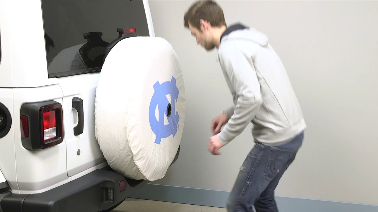 Tire cover installation for 2018 4 Door Wrangler JL with backup camera