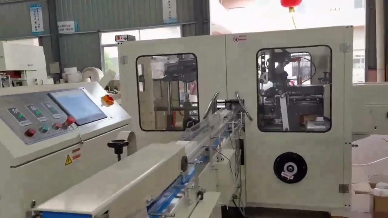 Automatic embossing facial tissue folding machine package production line