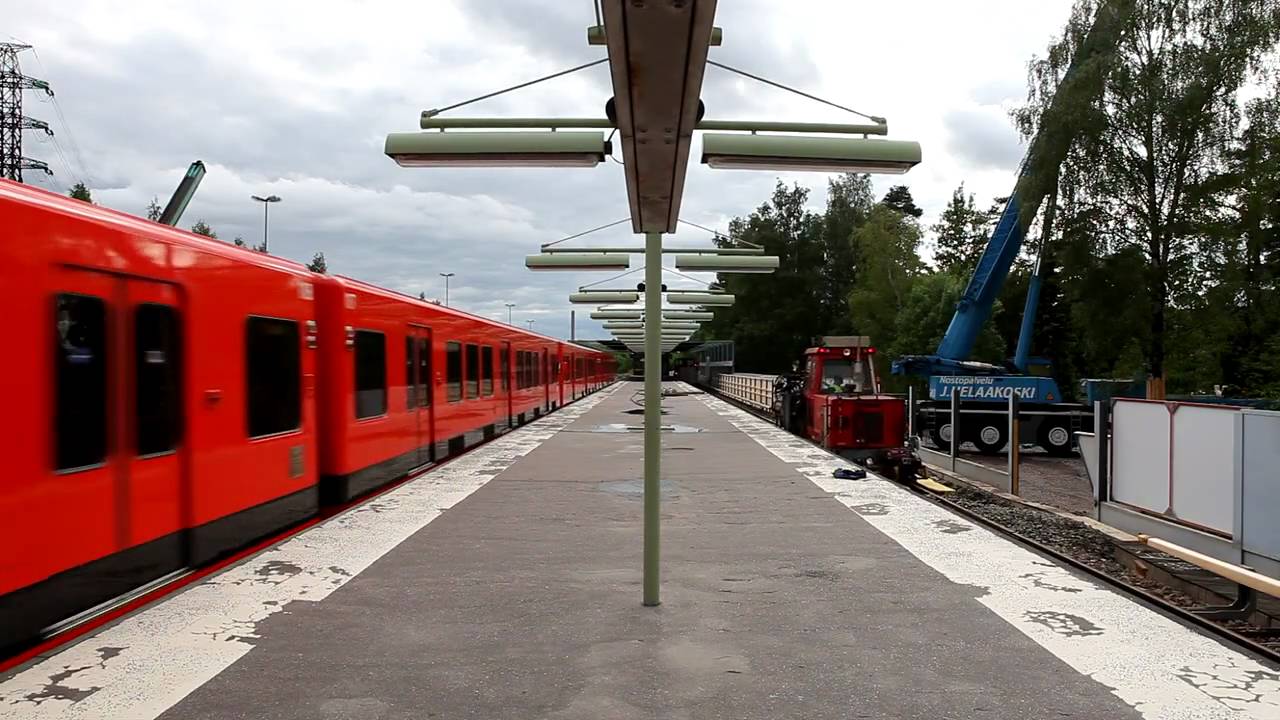 Metro train passing the closed Kulosaari metro station