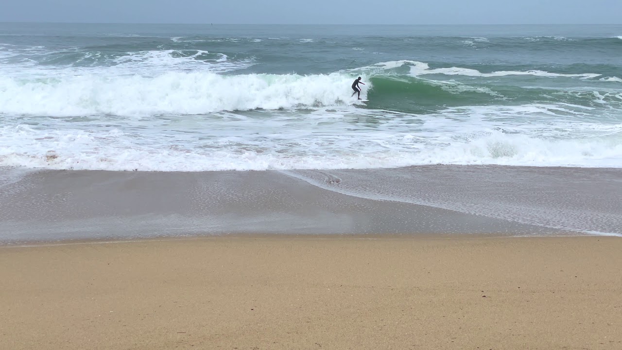 surfers in Half Moon Bay California   - Amazing waves on 1-12-21