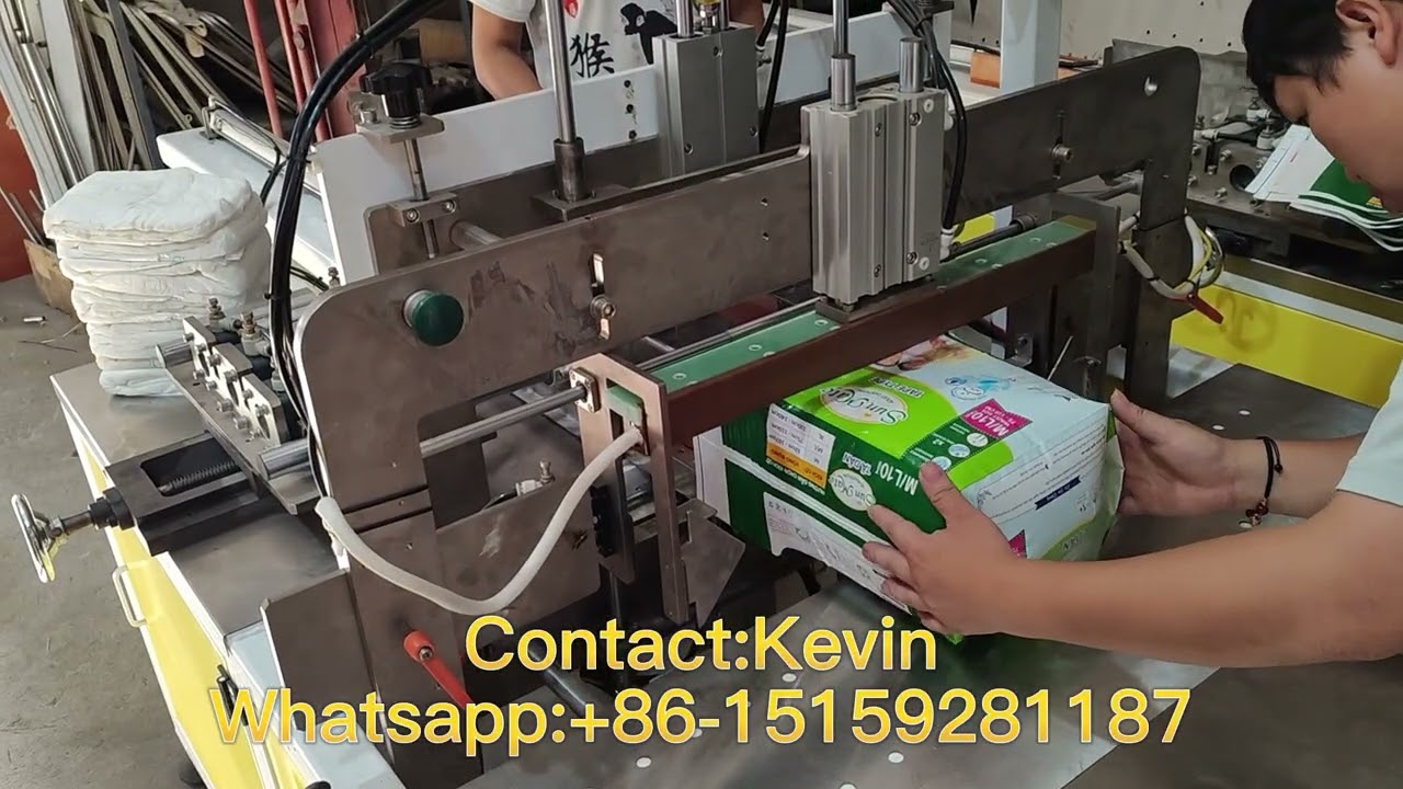 Semi Auto Jumbo Baby Diaper Adult Diaper Packing Machine Suppliers  Whatsapp: +86-15159281187