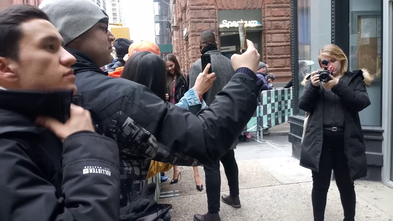 Miss Universe, Catriona Gray, taking pictures and signing for fans at AOL Build.