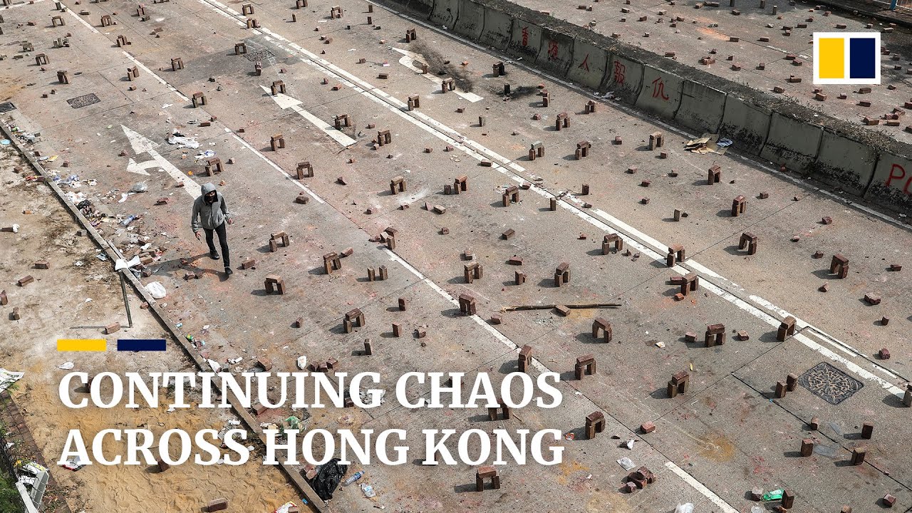 Tear gas and roadblocks across the city as protests continue to grip Hong Kong