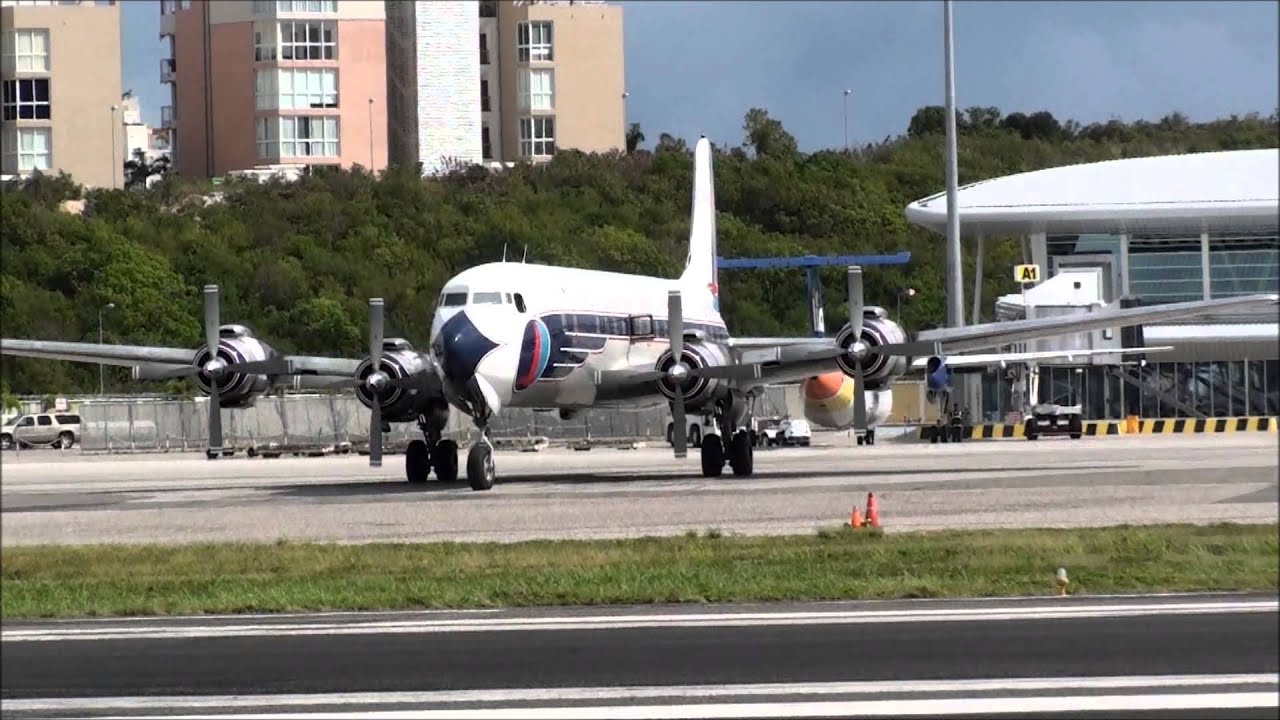SXM   Douglas DC 7 smokey start-St. Maarten