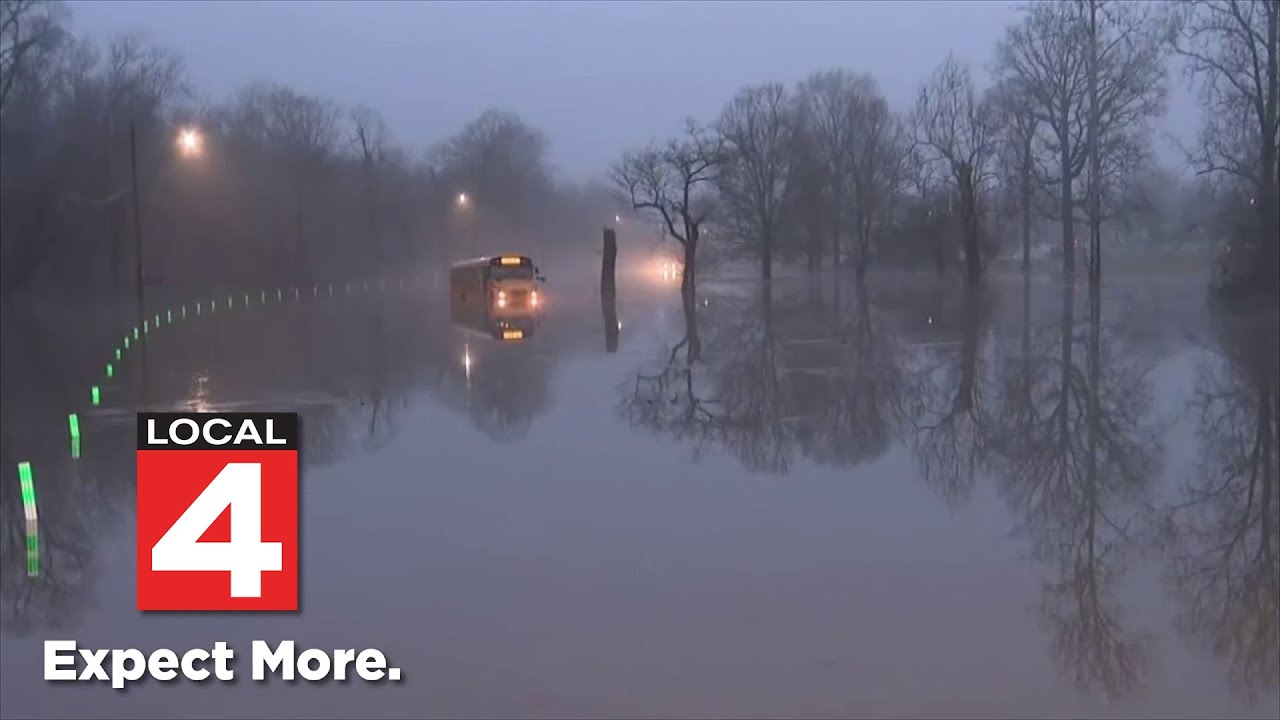 Students rescued from bus after being trapped on flooded road in Detroit