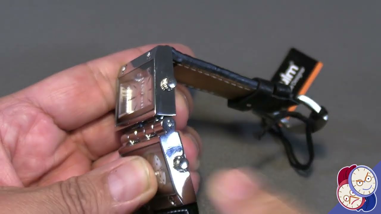 This triple-display watch has a freaking HINGE in it!