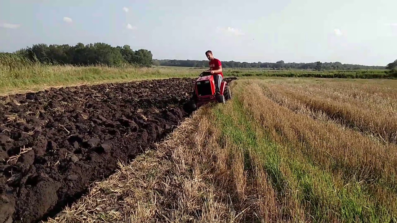 Plowing with Ingersoll 3018 and Brinly 10