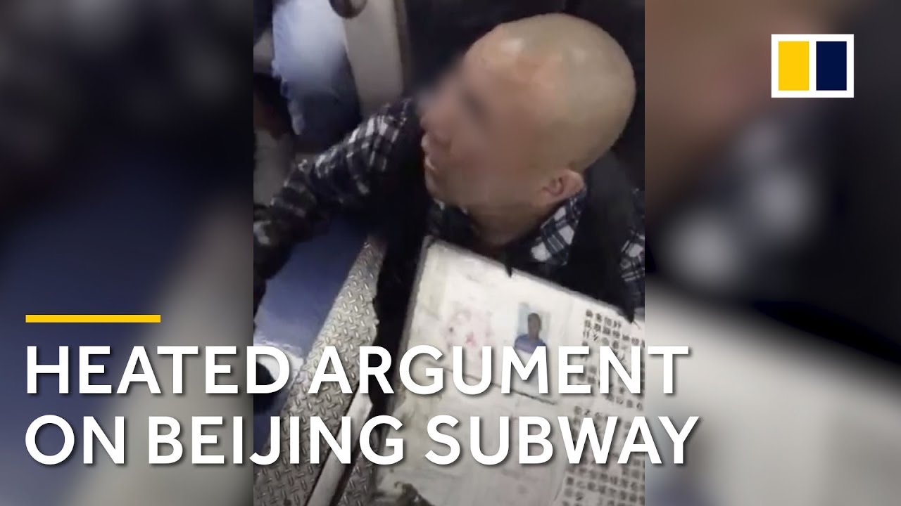 Chinese man gets into a heated argument with security on Beijing subway