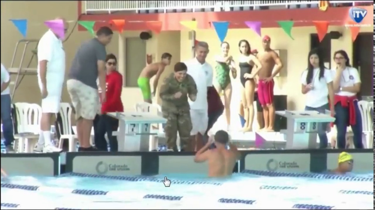Military mom surprises son in swimming competition