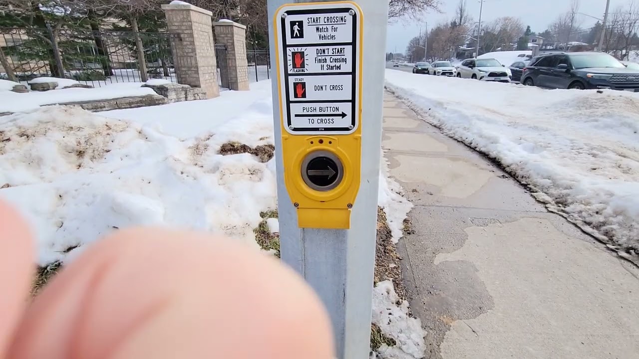Crosswalk button APS @Ester Dr and  Amherst heights EN2 and McCain 