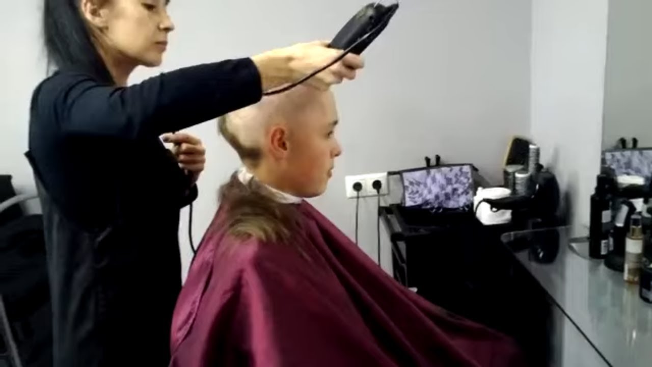 BRUTAL HEAD SHAVING: Female barber shaves boys head completely bald